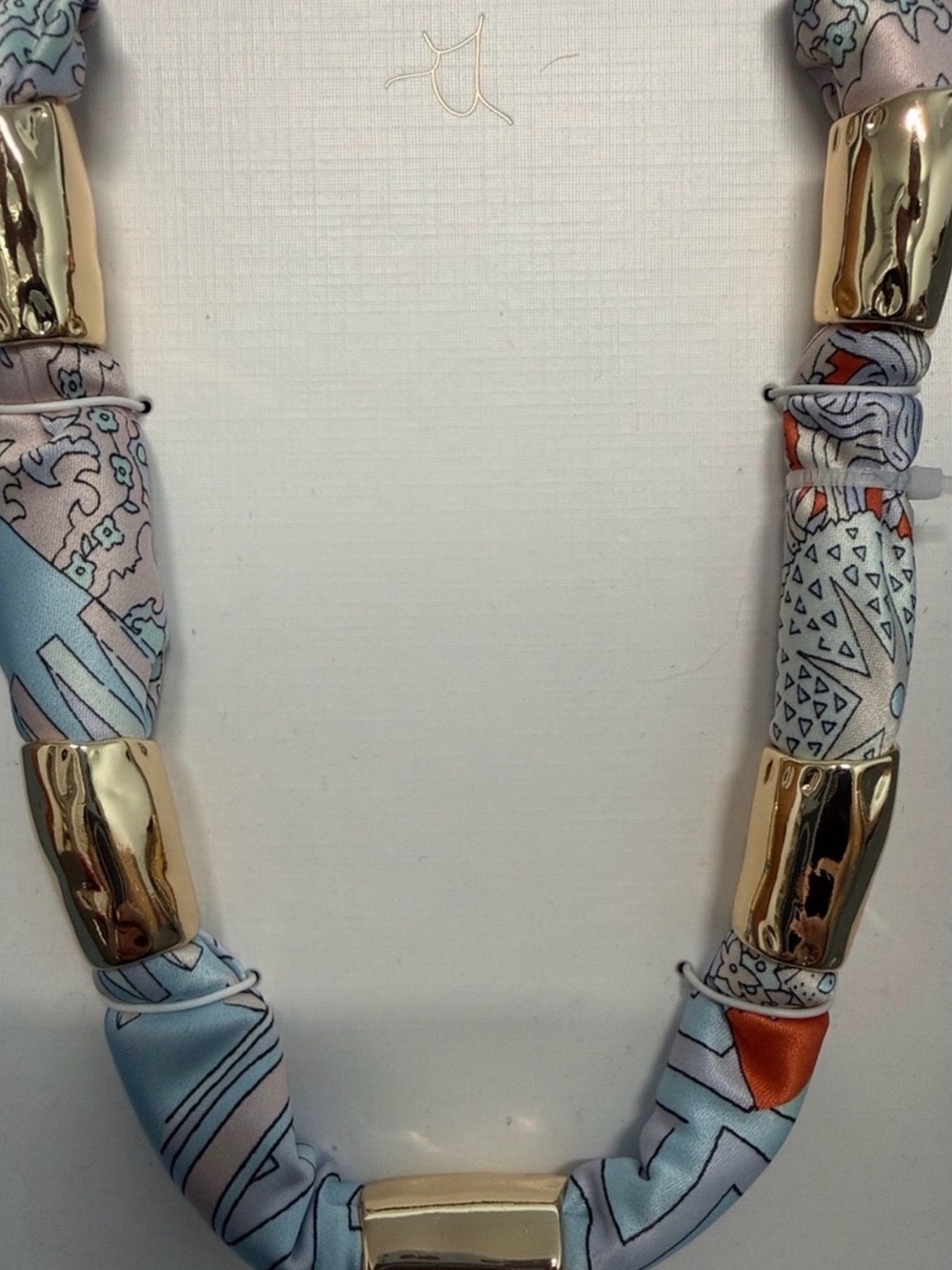 Piper K Pastel Blue and Gold Printed Silk Tube Necklace - Picture 2 of 5